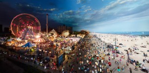 Stephen Wilkes, "Coney Island, Day To Night," 2011. Digital C-print, 40 x 80 inches. Courtesy Monroe Gallery of Photography.