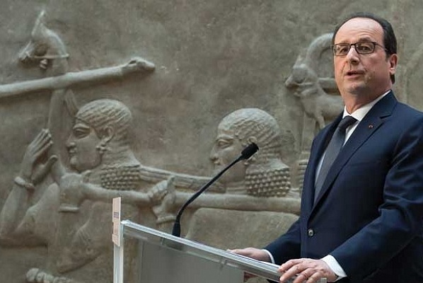 French president François Hollande at the Louvre, alongside its Assyrian antiquities, announcing that the museum would support colleagues in Iraq. © AP Photo